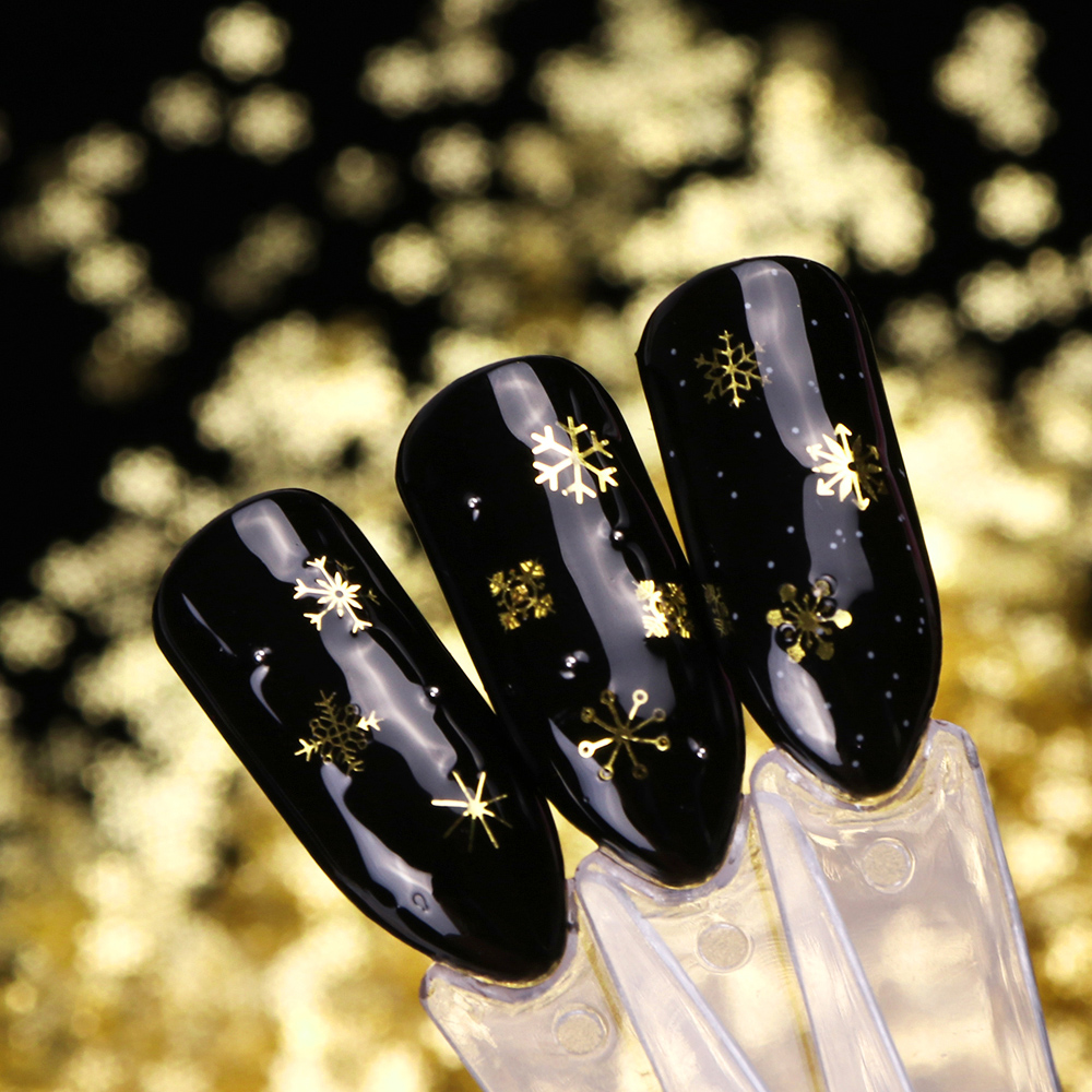 1箱のくり抜かれたネイルスパンコール,雪の雪片,混合デザイン - Gold Foil Flakes のレビューと価格